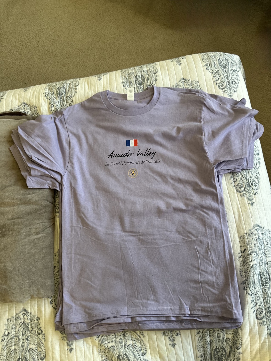Lavender tee with French flag, Amador Valley wordmark, and French Honor Society crest